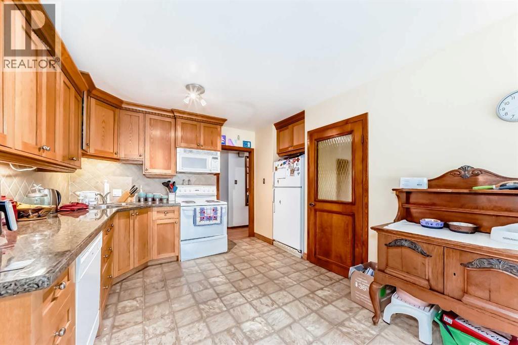 59 Rosewood Road Nw, Calgary, Alberta  T2K 1N3 - Photo 6 - A2261569
