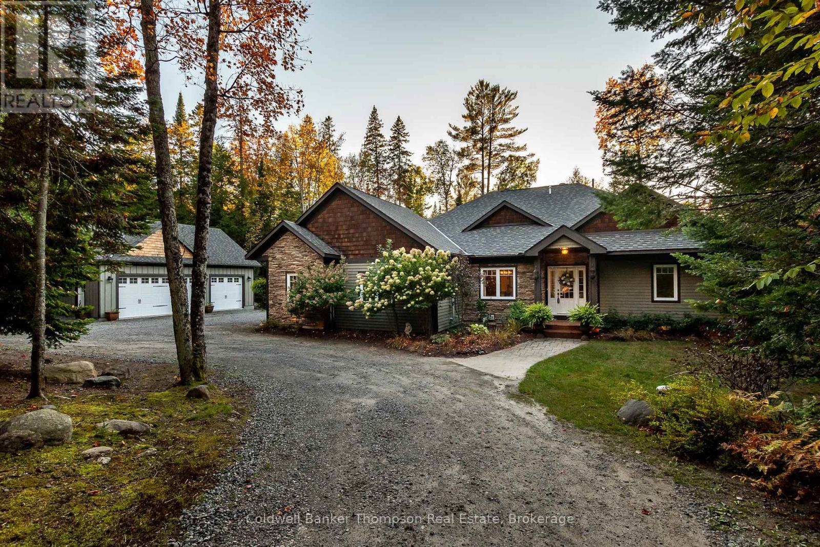 <div class="slider-price">$1,399,900</div><p>78 Orr Road, Huntsville, Ontario</p>