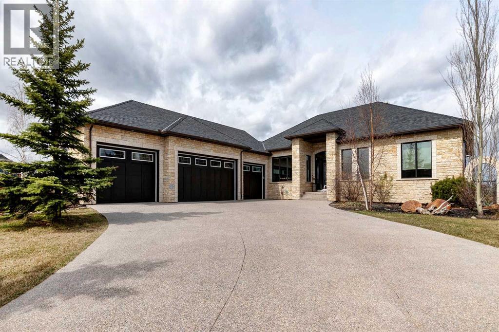 31 Montenaro Bay, Rural Rocky View County, Alberta  T4C 0A5 - Photo 4 - A2261173