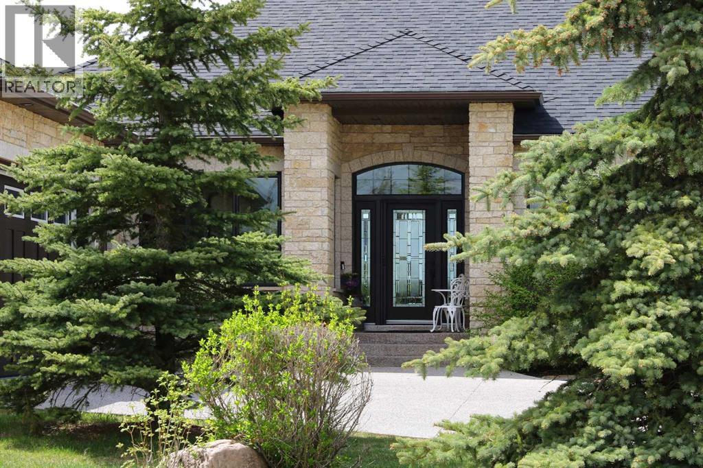 31 Montenaro Bay, Rural Rocky View County, Alberta  T4C 0A5 - Photo 7 - A2261173