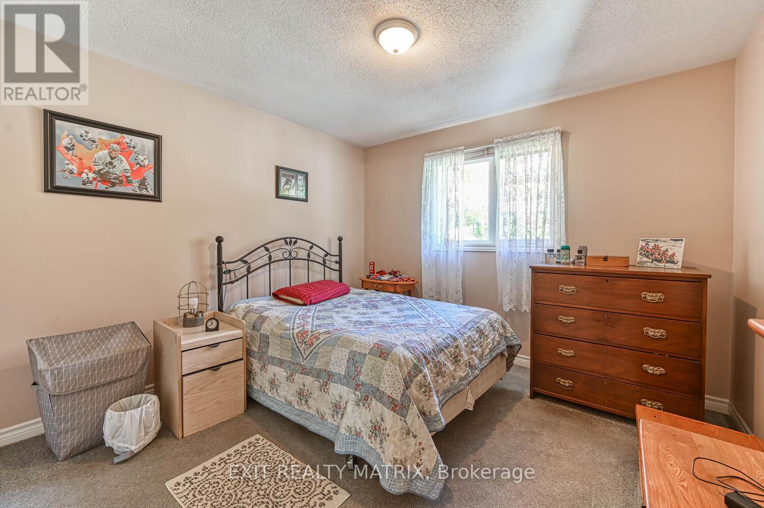 7719 Lawrence Street, Ottawa, Ontario  K0A 3J0 - Photo 11 - X12439966