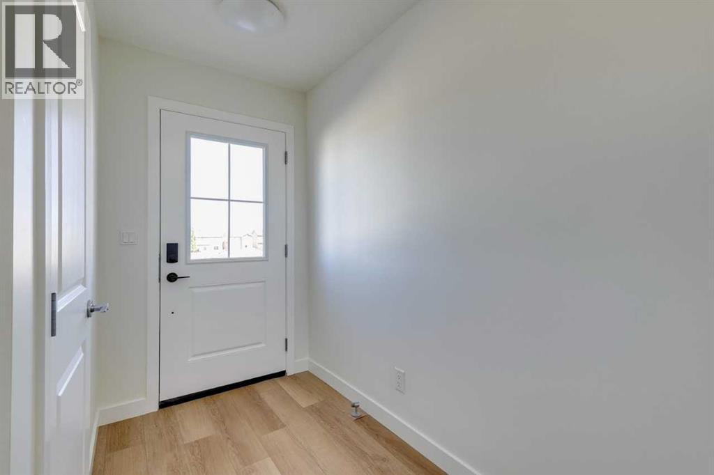 1414, 25 Wildwoods Court Sw, Airdrie, Alberta  T4B 3M9 - Photo 2 - A2224167