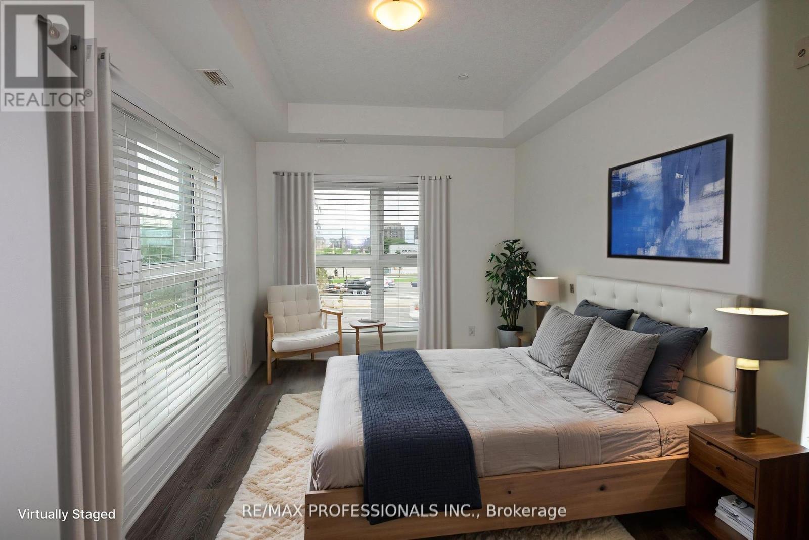 210 - 128 Grovewood Common, Oakville, Ontario  L6H 0X3 - Photo 12 - W12439833