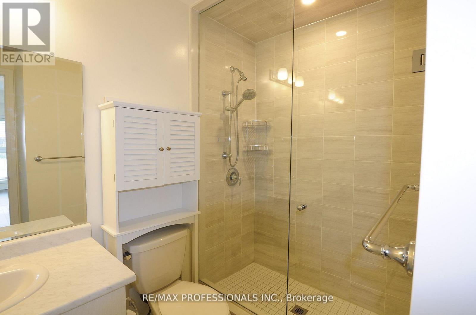 210 - 128 Grovewood Common, Oakville, Ontario  L6H 0X3 - Photo 16 - W12439833