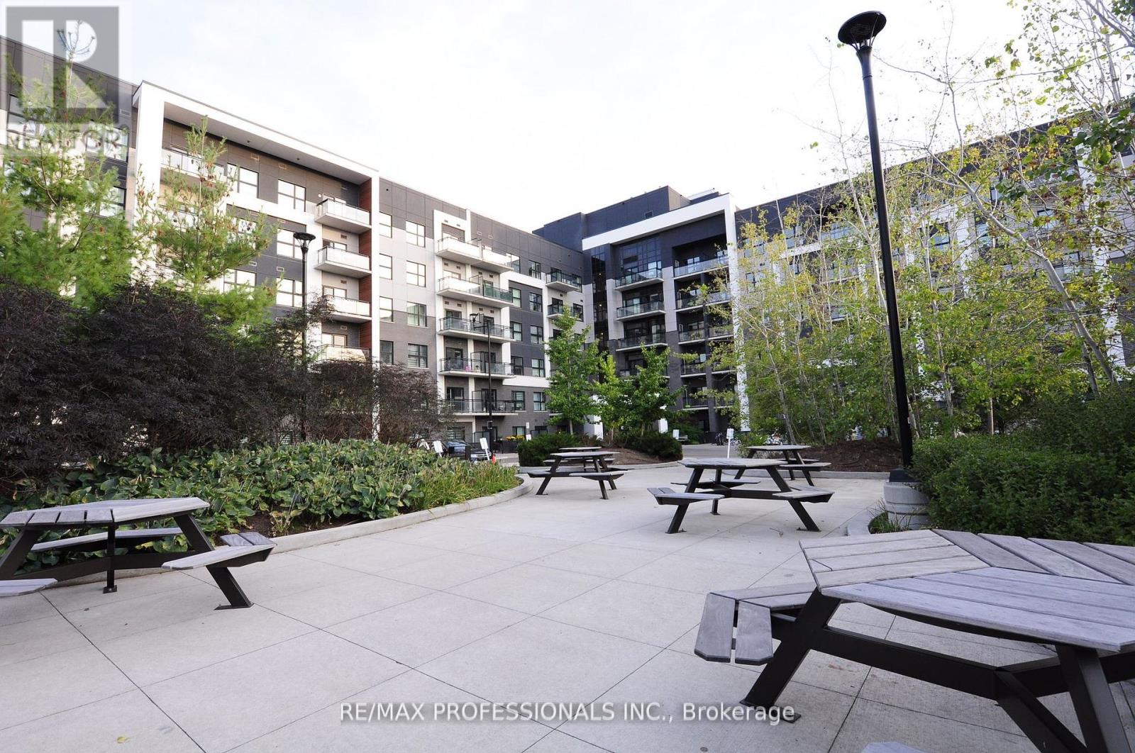 210 - 128 Grovewood Common, Oakville, Ontario  L6H 0X3 - Photo 2 - W12439833