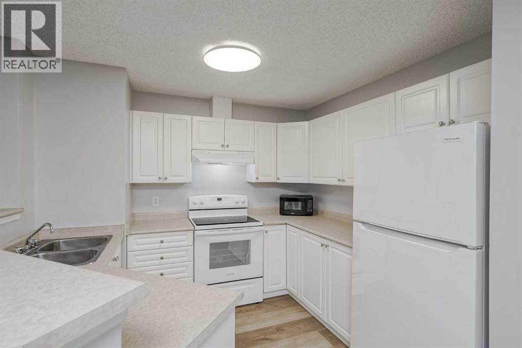 6118, 6000 Somervale Court Sw, Calgary, Alberta  T2Y 4J4 - Photo 3 - A2259397