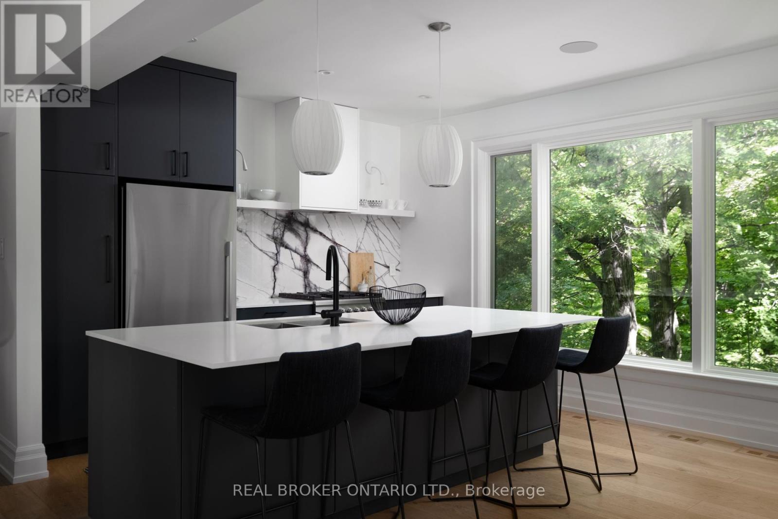 5 Wembley Drive, Toronto, Ontario  M4L 3C9 - Photo 2 - E12440054