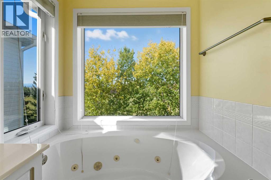 56 Rocky Ridge Drive Nw, Calgary, Alberta  T3G 4G1 - Photo 20 - A2256617