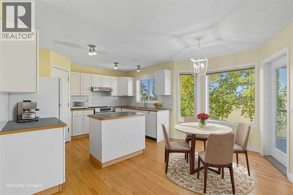 56 Rocky Ridge Drive Nw, Calgary, Alberta  T3G 4G1 - Photo 2 - A2256617