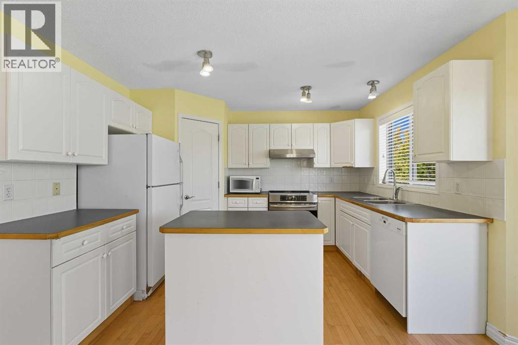 56 Rocky Ridge Drive Nw, Calgary, Alberta  T3G 4G1 - Photo 7 - A2256617