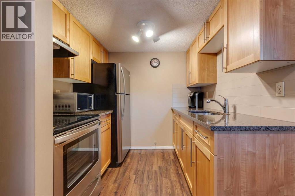 116, 1055 72 Avenue Nw, Calgary, Alberta  T2K 5S4 - Photo 3 - A2257300