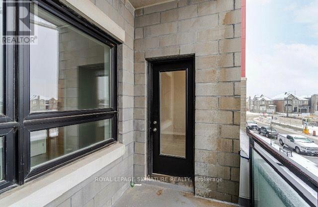 215 - 3265 Carding Mill Trail, Oakville, Ontario  L6M 1S1 - Photo 11 - W12438876