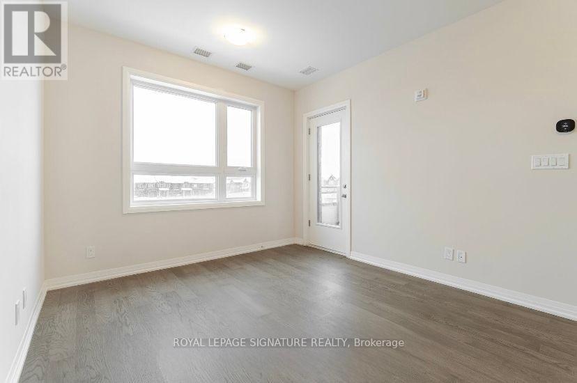 215 - 3265 Carding Mill Trail, Oakville, Ontario  L6M 1S1 - Photo 5 - W12438876