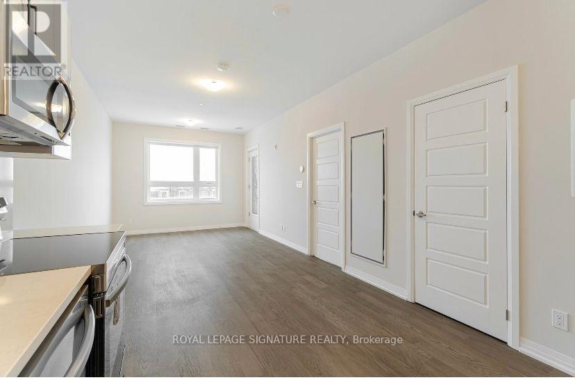 215 - 3265 Carding Mill Trail, Oakville, Ontario  L6M 1S1 - Photo 10 - W12438876