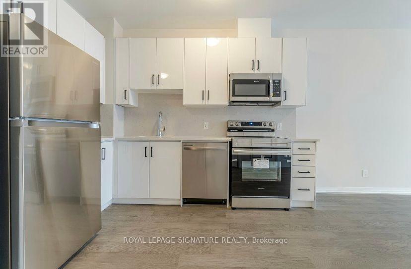 215 - 3265 Carding Mill Trail, Oakville, Ontario  L6M 1S1 - Photo 9 - W12438876