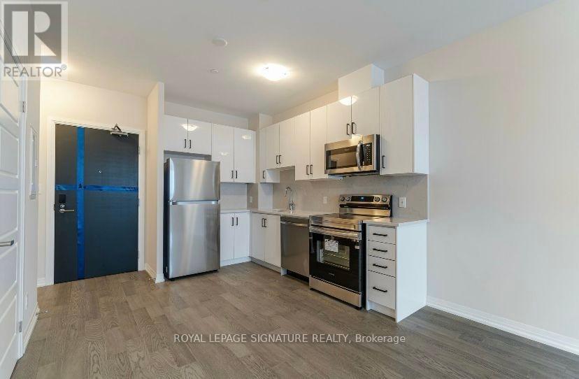 215 - 3265 Carding Mill Trail, Oakville, Ontario  L6M 1S1 - Photo 6 - W12438876