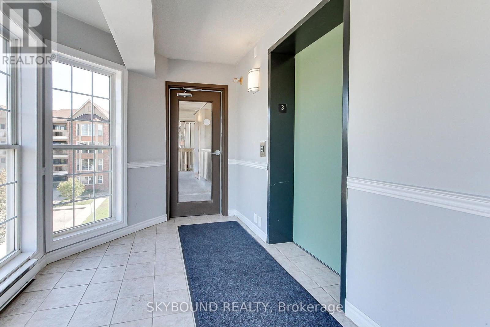 302 - 4003 Kilmer Drive, Burlington, Ontario  L7M 4M1 - Photo 3 - W12440297