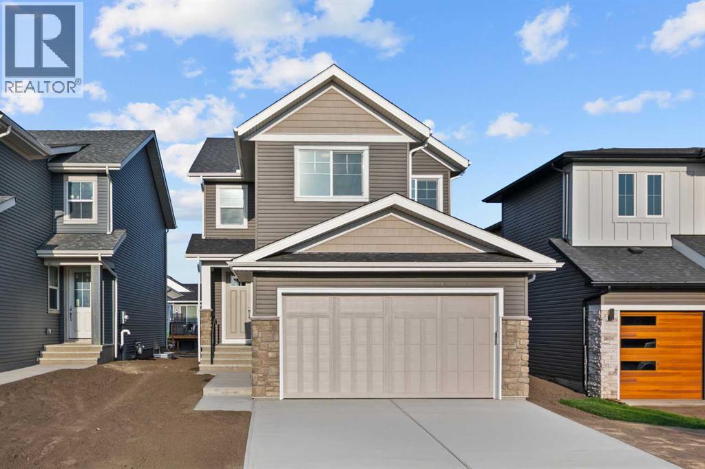 22 Emerson Crescent, Okotoks, Alberta  T1S 5W7 - Photo 1 - A2258763