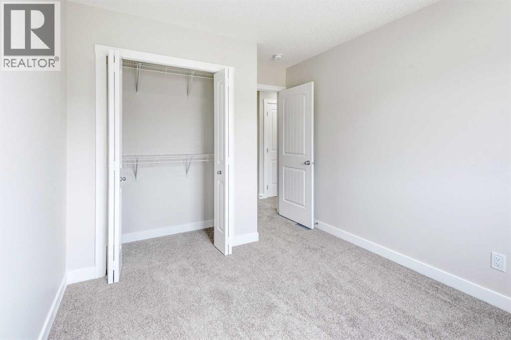 166 Creekview Gardens Sw, Calgary, Alberta  T2X 5X8 - Photo 17 - A2215819