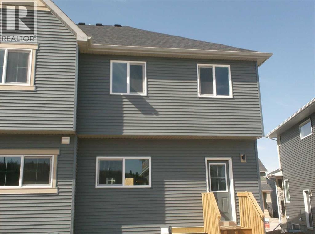 166 Creekview Gardens Sw, Calgary, Alberta  T2X 5X8 - Photo 6 - A2215819