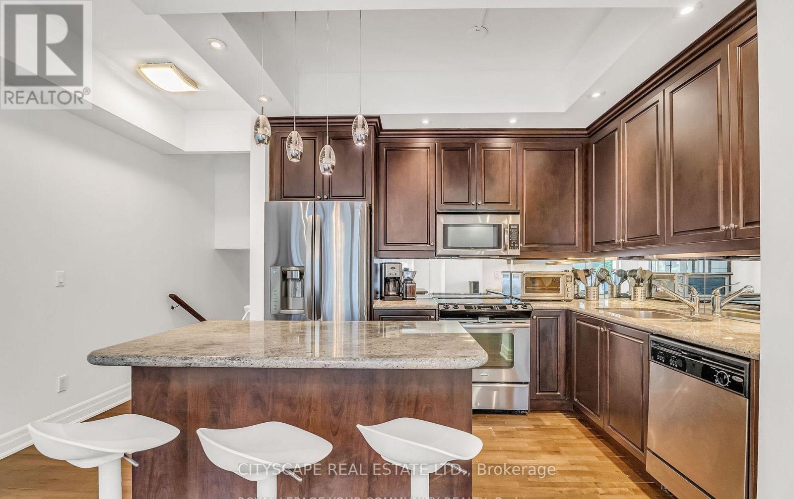 Th 7 - 81 Sloping Sky Mews, Toronto, Ontario  M5V 1P4 - Photo 18 - C12440580