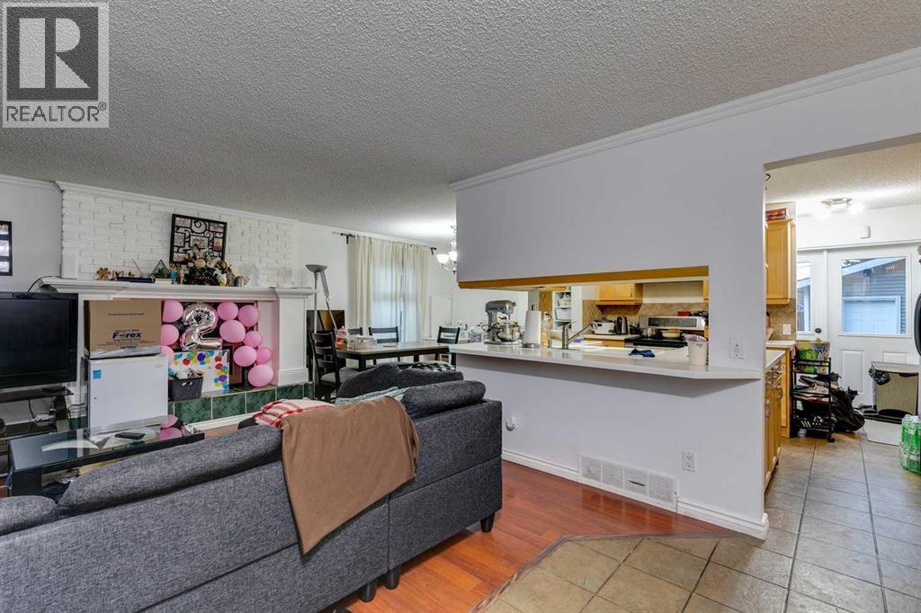 100 Allandale Close Se, Calgary, Alberta  T2H 1V9 - Photo 3 - A2261574