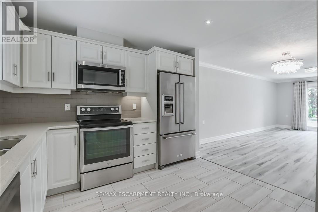 47 Szollosy Circle, Hamilton, Ontario  L9B 1T8 - Photo 6 - X12440550