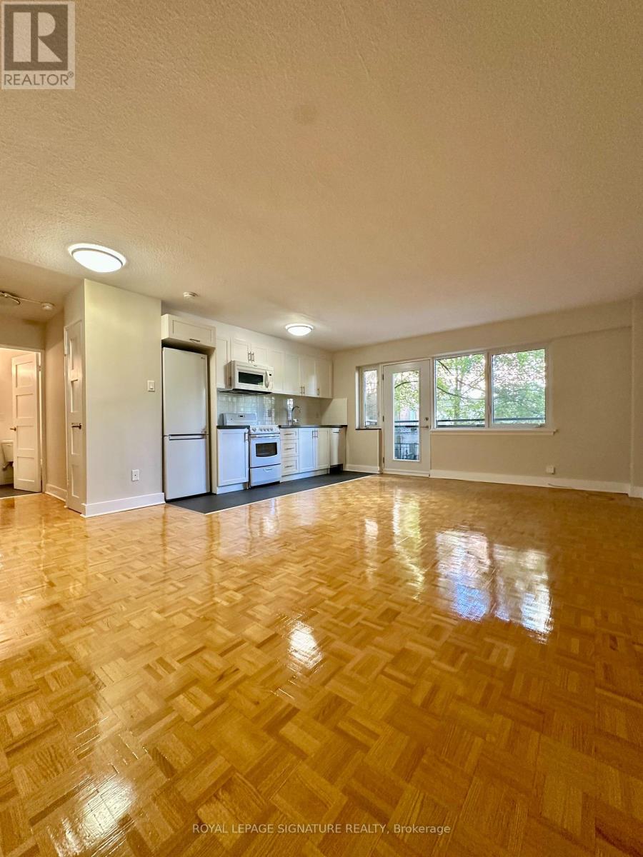 102 - 95 Lawton Boulevard, Toronto, Ontario  M4V 1Z8 - Photo 1 - C12440622