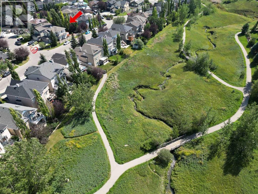504 Panatella Court Nw, Calgary, Alberta  T3K 5Z7 - Photo 2 - A2251948