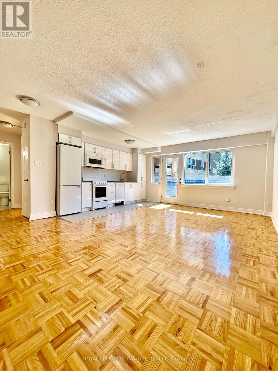 205 - 95 Lawton Boulevard, Toronto, Ontario  M4V 1Z8 - Photo 1 - C12440680