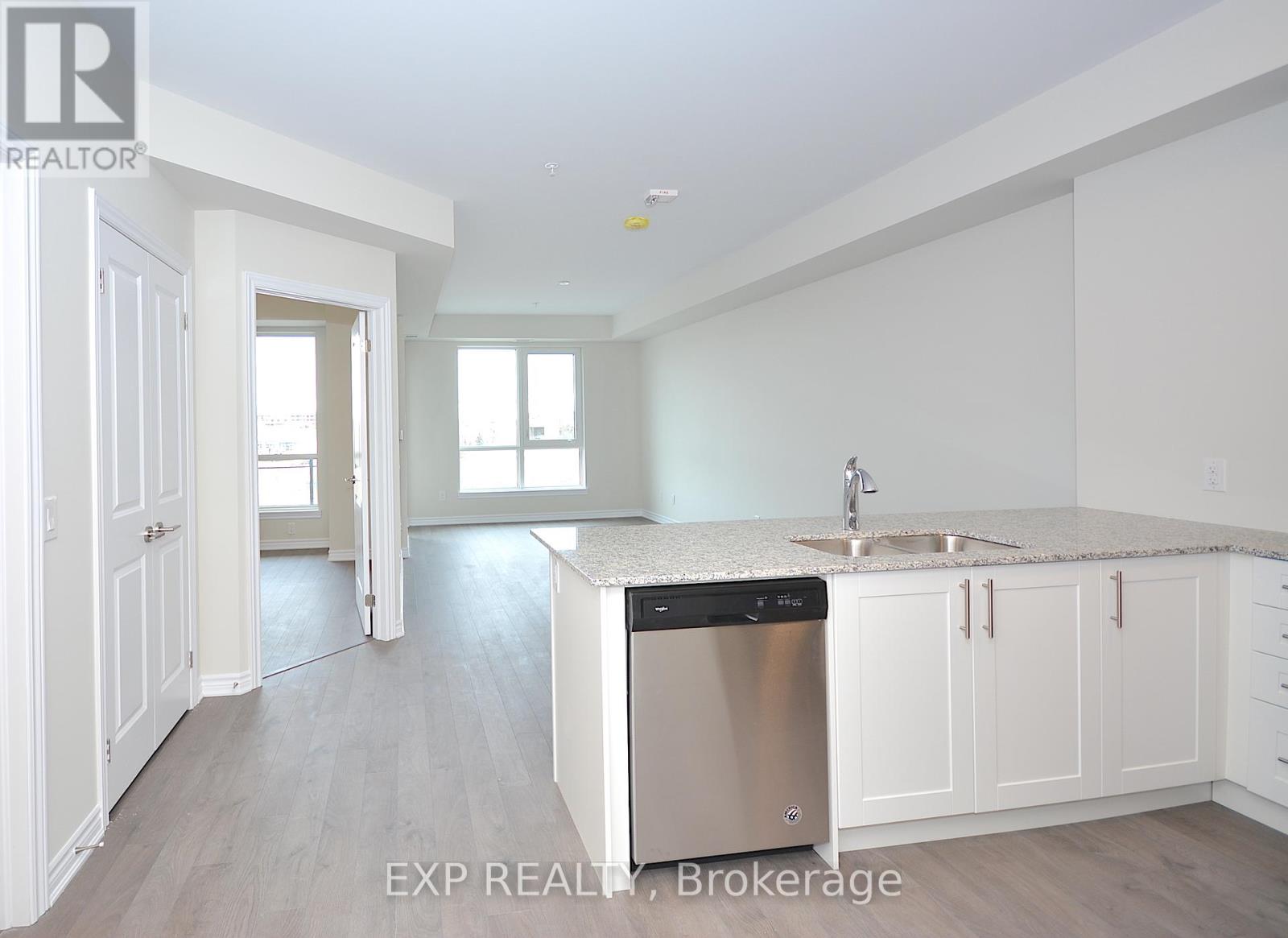 316 - 150 Oak Park Boulevard, Oakville, Ontario  L6H 0E7 - Photo 3 - W12440739