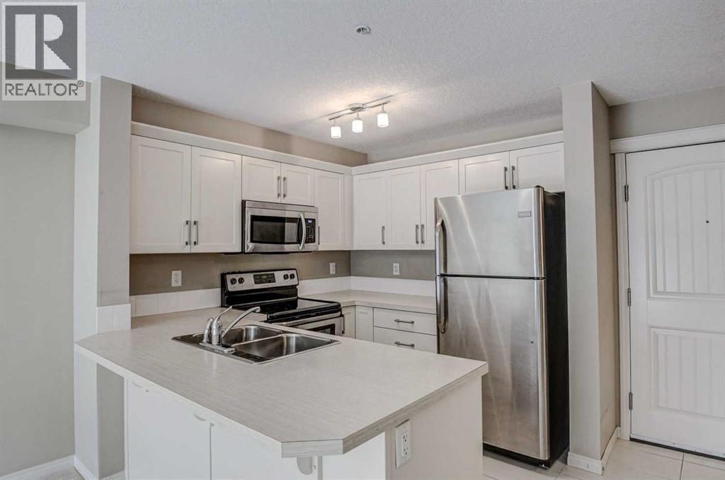 2217, 130 Panatella Street Nw, Calgary, Alberta  T3K 0Y6 - Photo 3 - A2261059