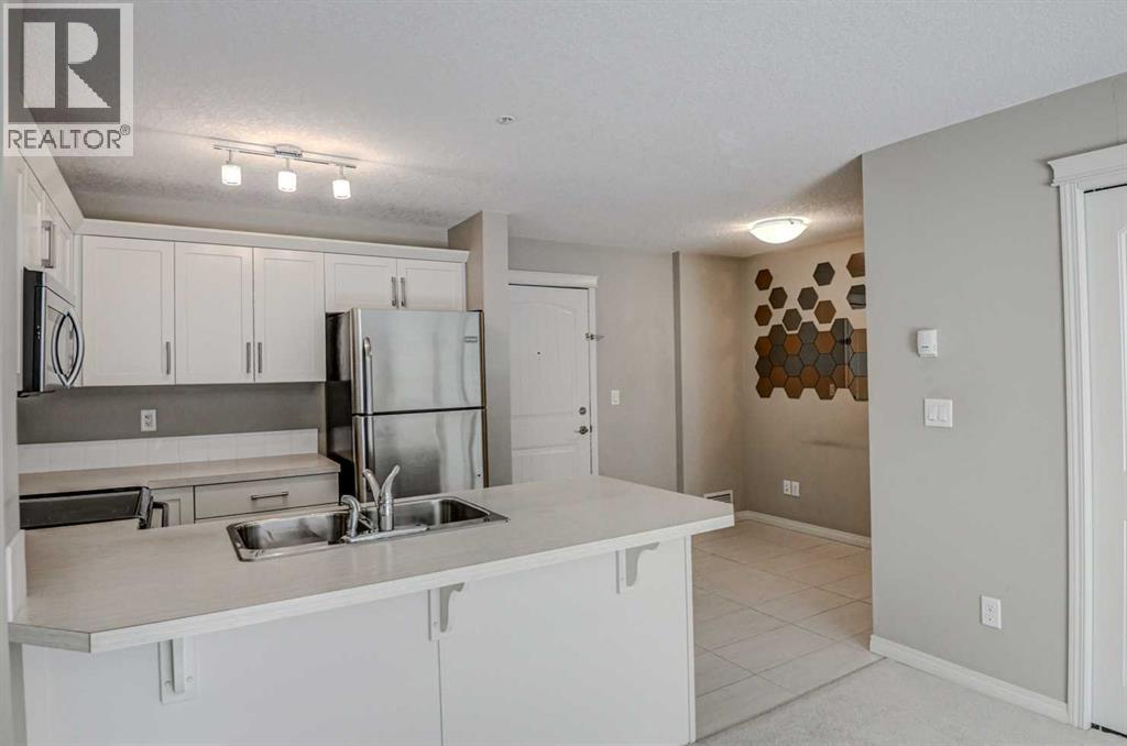 2217, 130 Panatella Street Nw, Calgary, Alberta  T3K 0Y6 - Photo 5 - A2261059