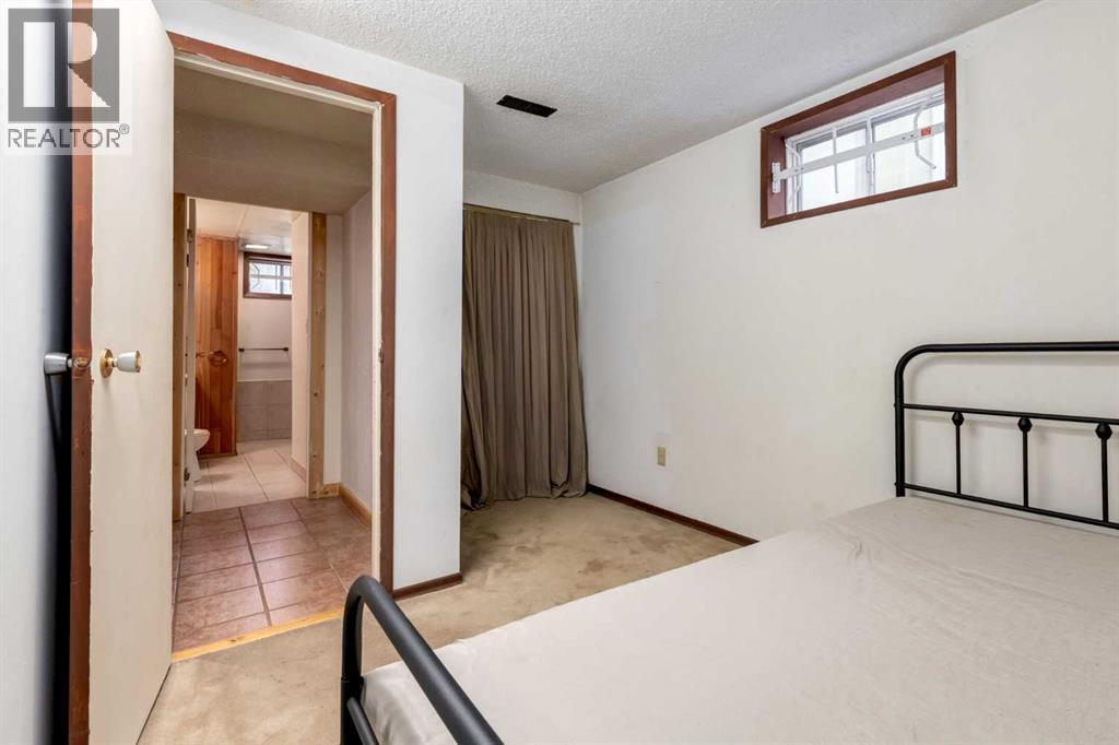 7103 Hunterwood Road Nw, Calgary, Alberta  T2K 4J5 - Photo 30 - A2250804
