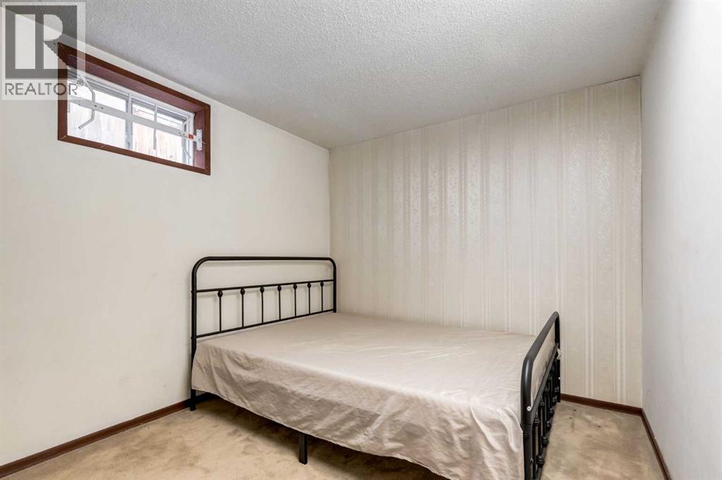7103 Hunterwood Road Nw, Calgary, Alberta  T2K 4J5 - Photo 29 - A2250804