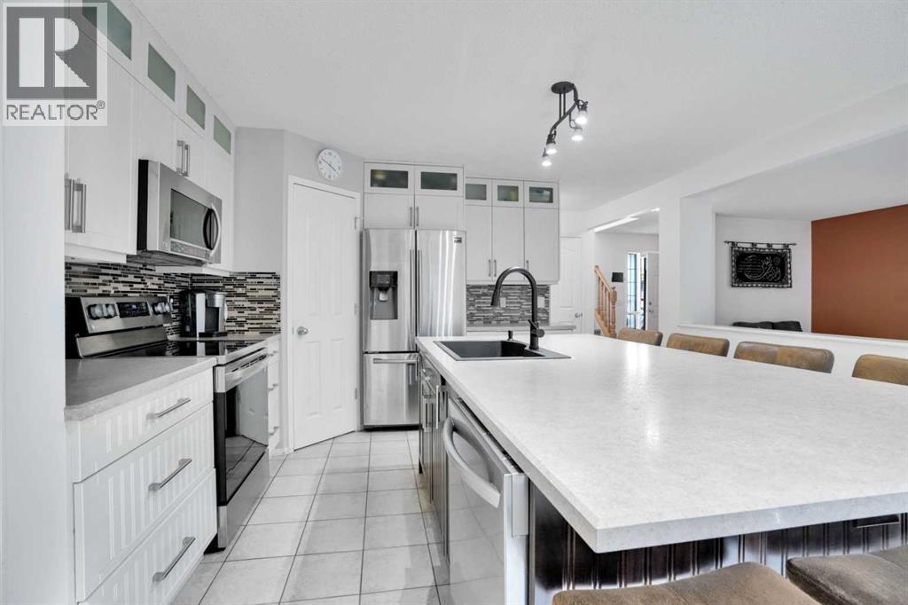 264 Harvest Hills Drive Ne, Calgary, Alberta  t3k 4h7 - Photo 8 - A2243711