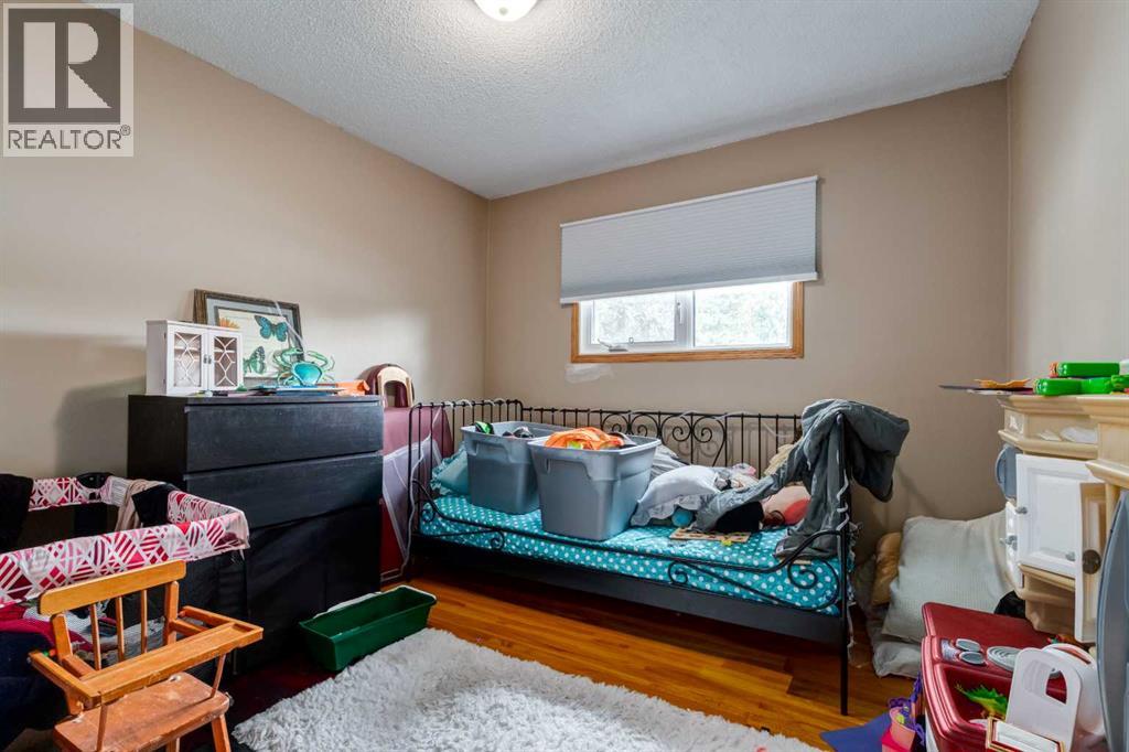 7711 Bowcliffe Crescent Nw, Calgary, Alberta  T3B 2S5 - Photo 16 - A2260325