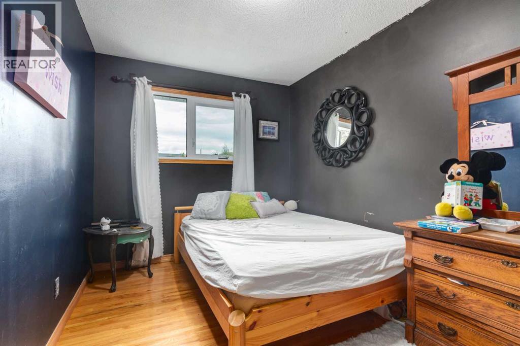 7711 Bowcliffe Crescent Nw, Calgary, Alberta  T3B 2S5 - Photo 11 - A2260325
