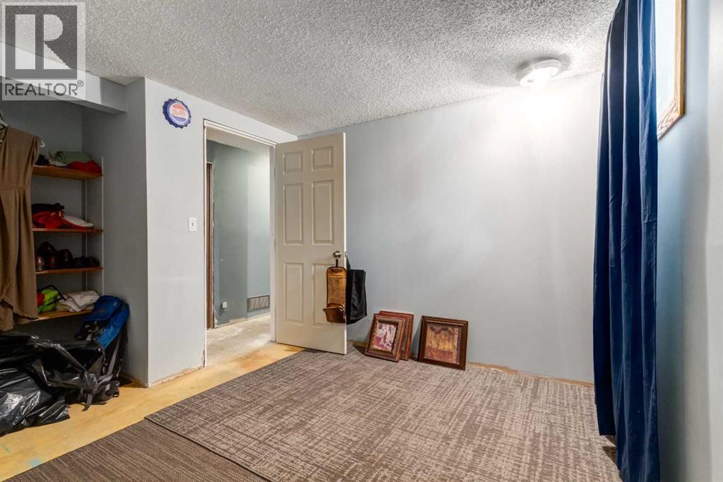 7711 Bowcliffe Crescent Nw, Calgary, Alberta  T3B 2S5 - Photo 23 - A2260325