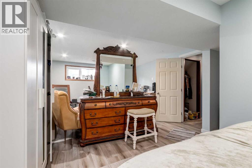 7711 Bowcliffe Crescent Nw, Calgary, Alberta  T3B 2S5 - Photo 19 - A2260325
