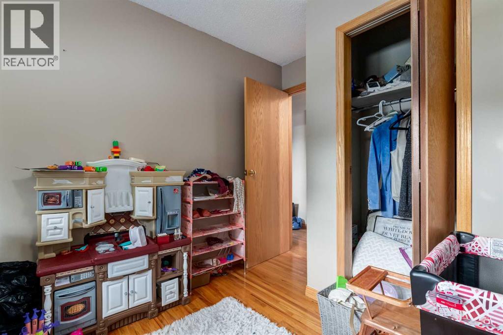 7711 Bowcliffe Crescent Nw, Calgary, Alberta  T3B 2S5 - Photo 17 - A2260325