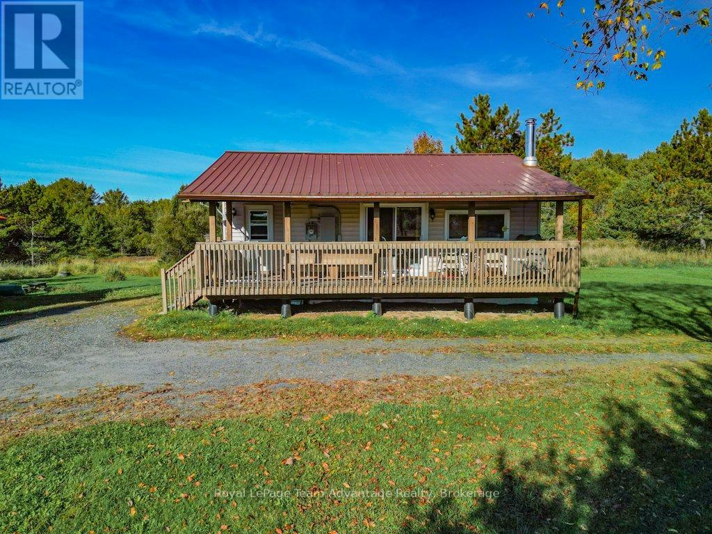 292 Mcdougall Road, Mcdougall, Ontario  P2A 0B3 - Photo 3 - X12441091
