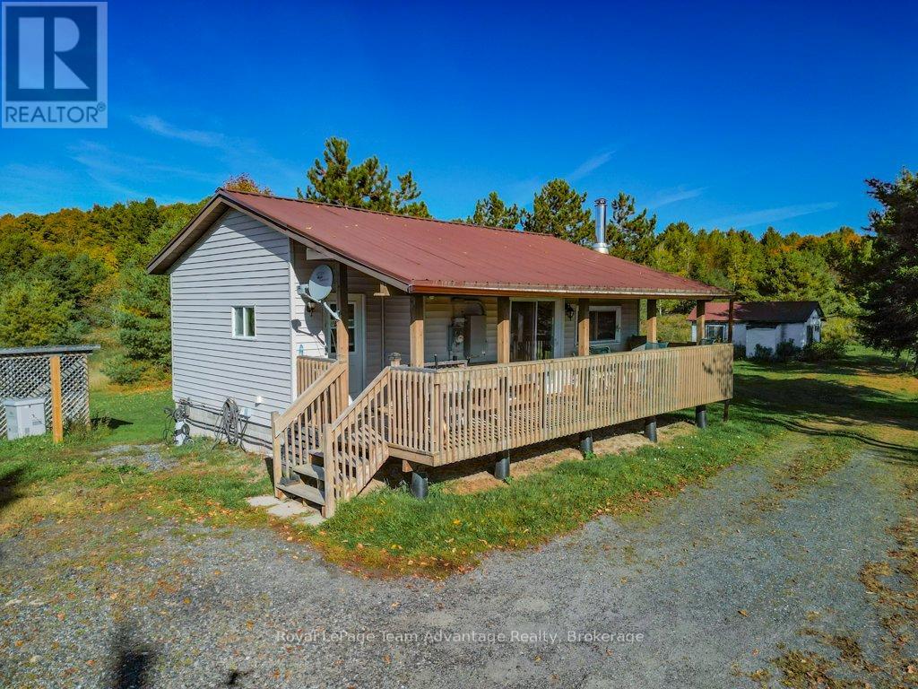 292 Mcdougall Road, Mcdougall, Ontario  P2A 0B3 - Photo 4 - X12441091