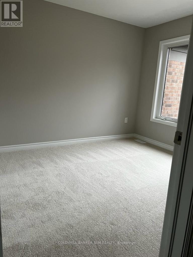 22 Keppel Circle, Brampton, Ontario  L7A 5K4 - Photo 7 - W12440892