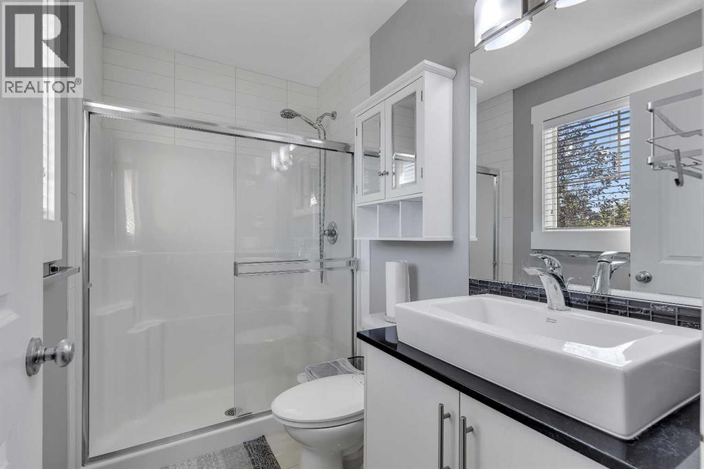 7 West Coach Manor Sw, Calgary, Alberta  T3H 1R7 - Photo 28 - A2258969