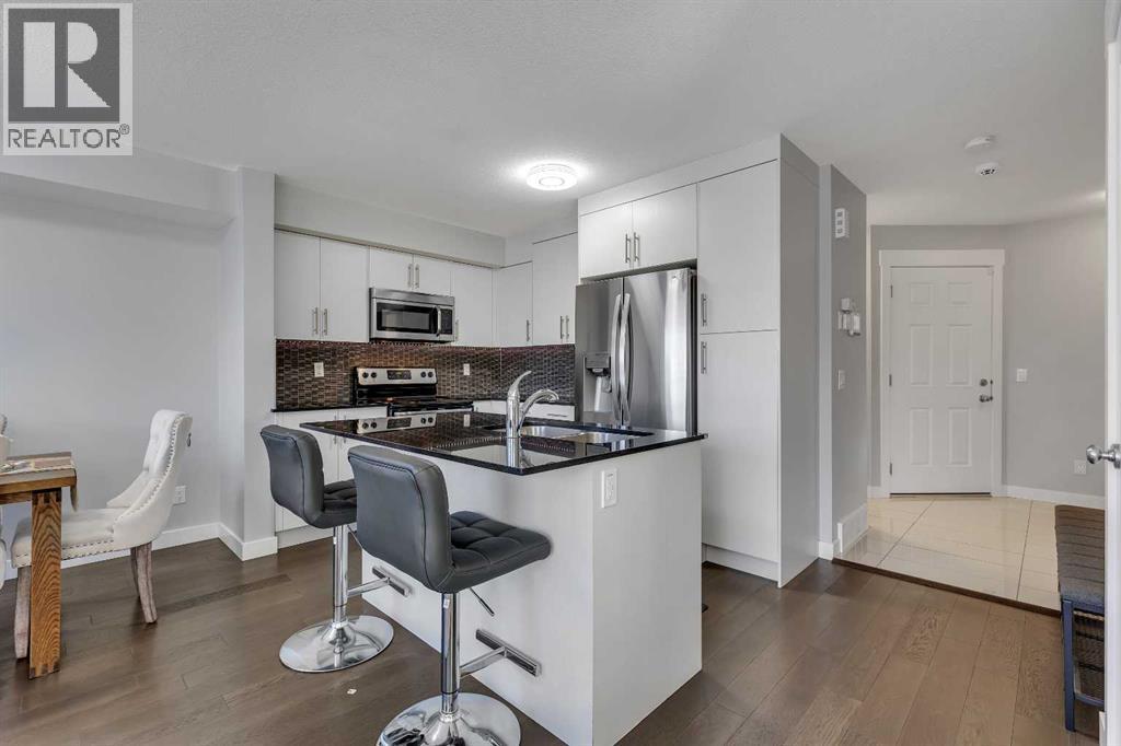 7 West Coach Manor Sw, Calgary, Alberta  T3H 1R7 - Photo 14 - A2258969
