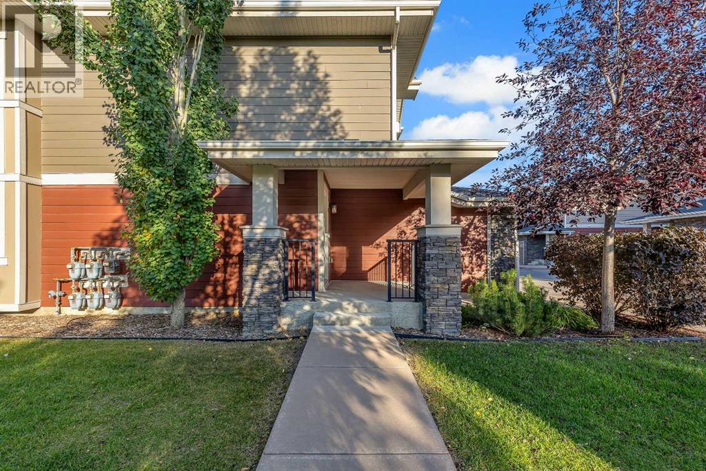 7 West Coach Manor Sw, Calgary, Alberta  T3H 1R7 - Photo 4 - A2258969