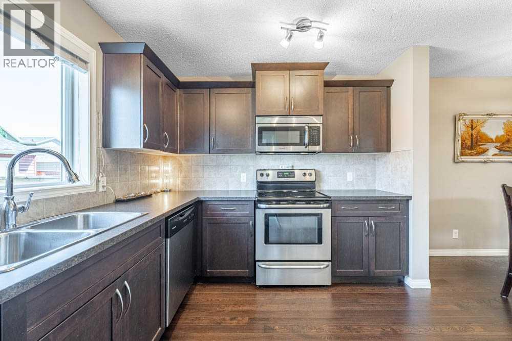 48 Fireside Way, Cochrane, Alberta  T4C 0R1 - Photo 9 - A2247199