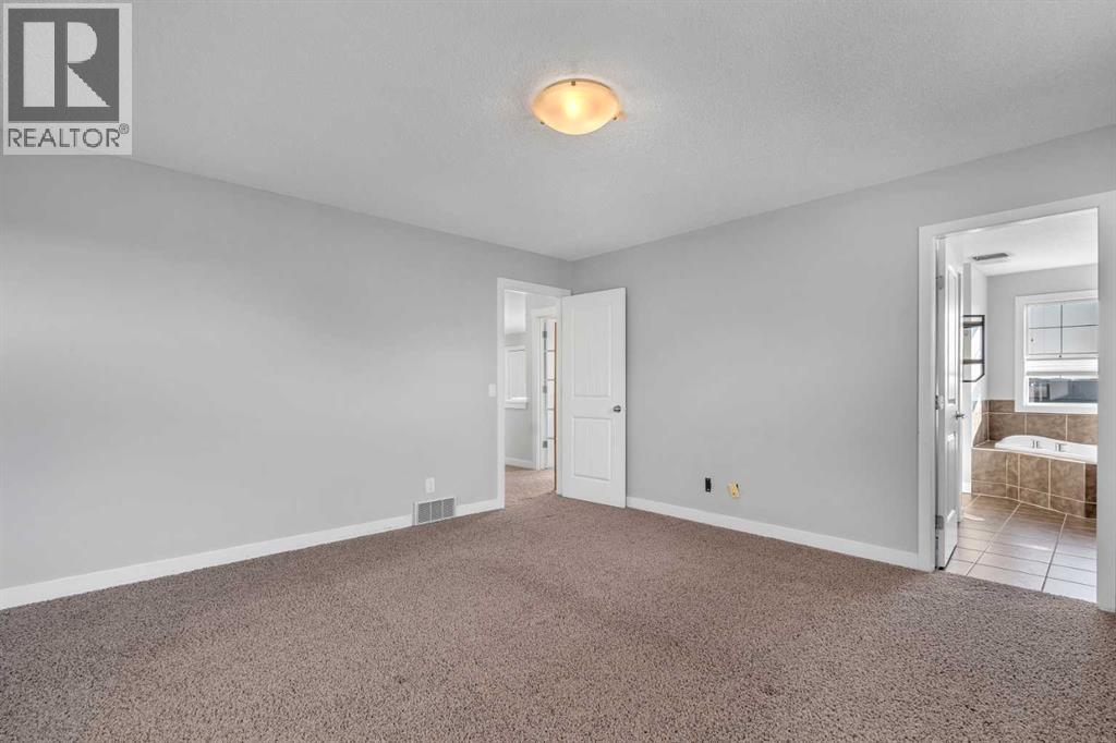 264 Morningside Green Sw, Airdrie, Alberta  T4B 3M4 - Photo 27 - A2258563