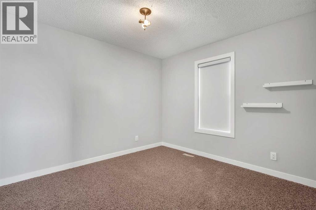 264 Morningside Green Sw, Airdrie, Alberta  T4B 3M4 - Photo 31 - A2258563